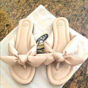 A new day Gently used ladies slip on sandals 👡